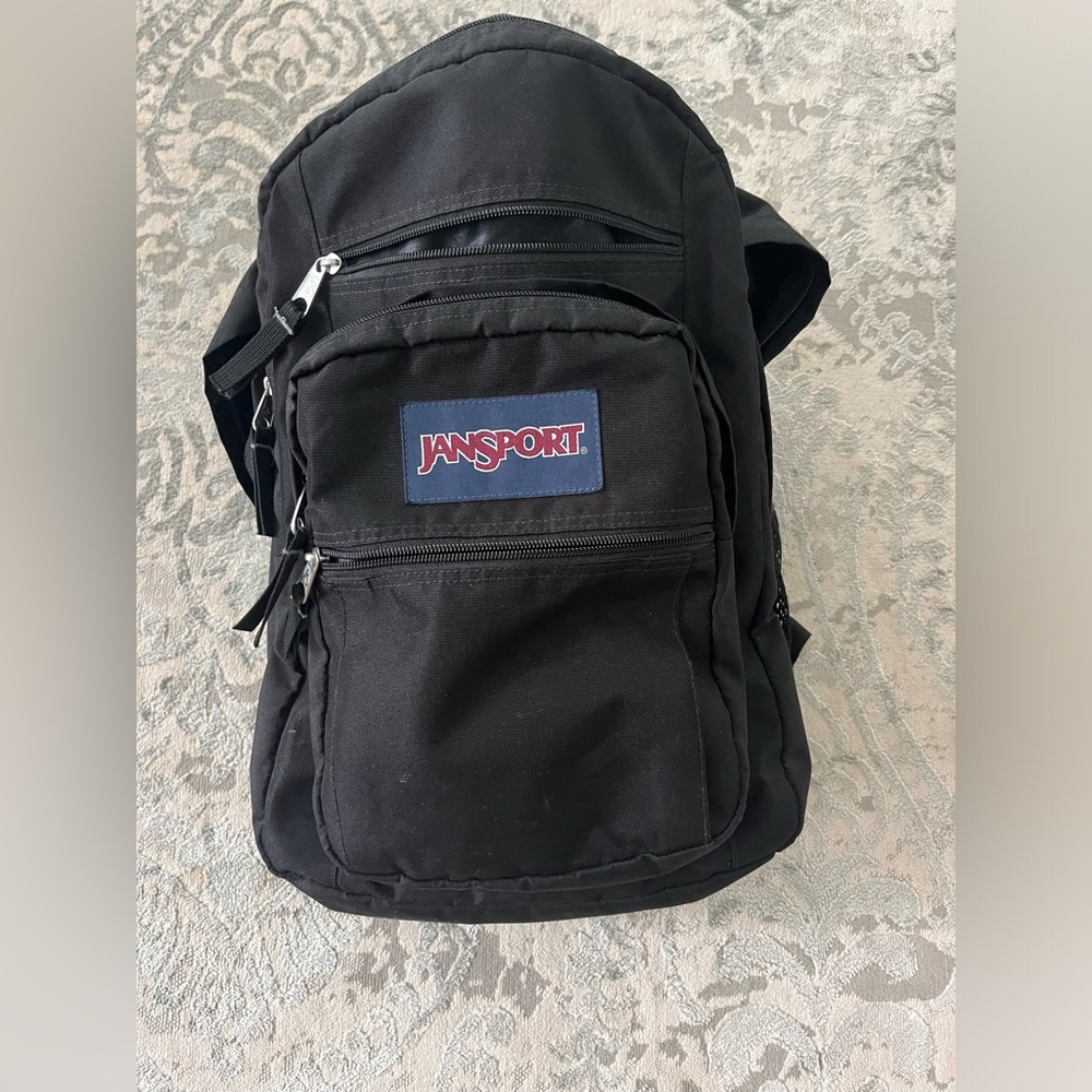 Black Backpack with multiple pockets.